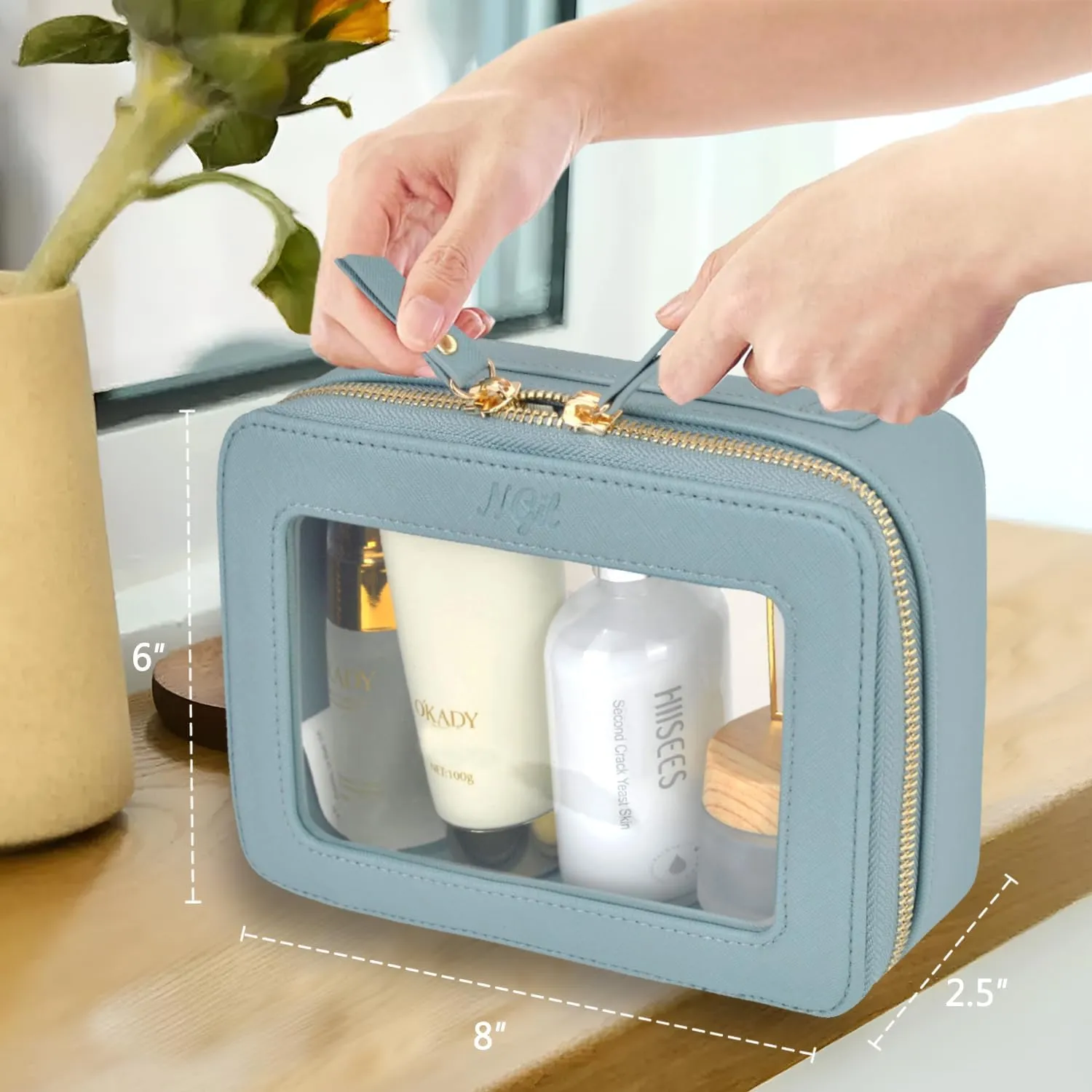NGIL Clear Faux Leather Travel Toiletry Bag, Makeup Bag Organizer for Women, Clear Window & Gold Zipper Makeup Bag, Road Trip Essential, Skincare, Cruise Ship Essentials (Blue)